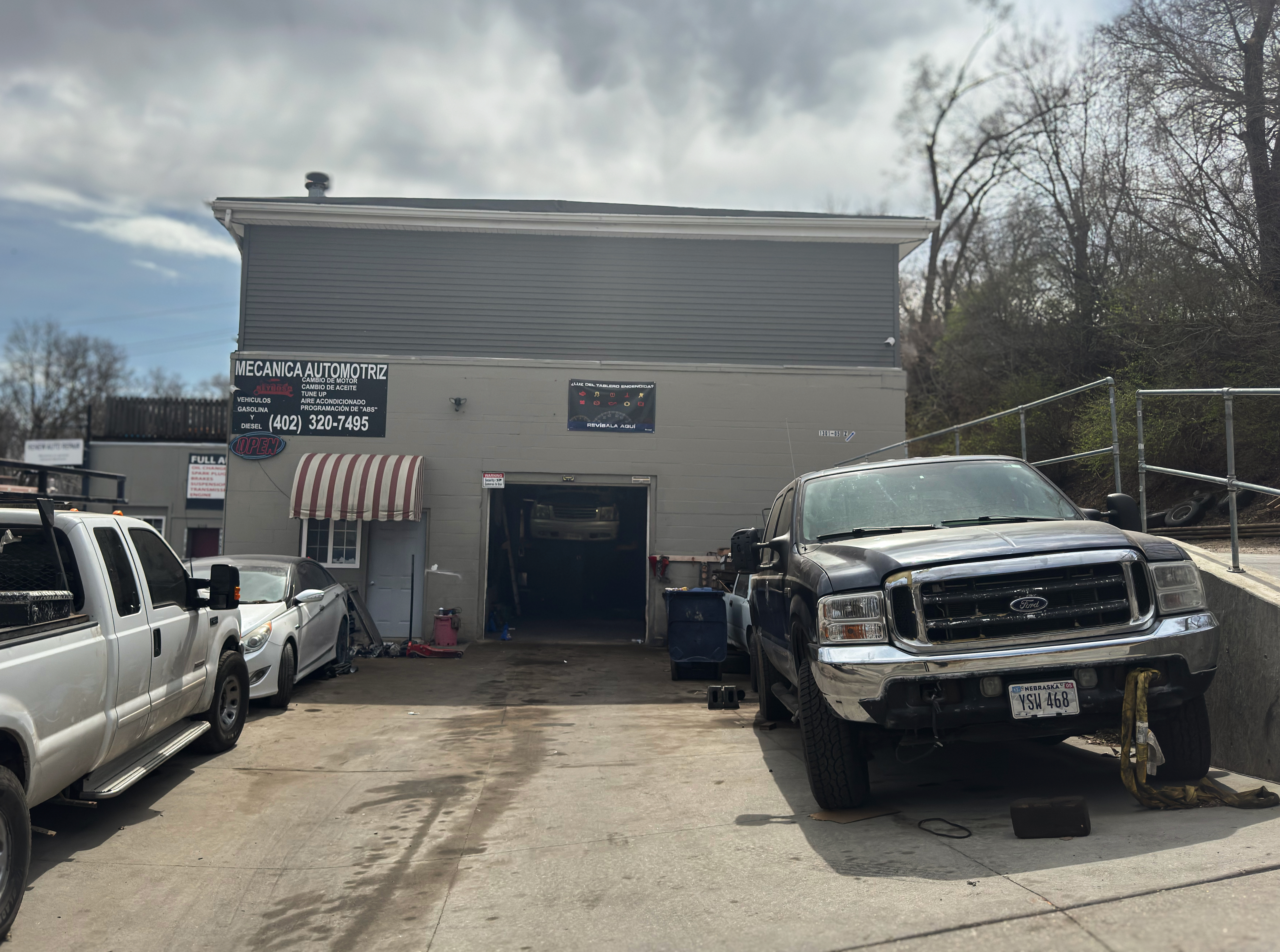 Reynoso Auto Repair technician working on vehicle